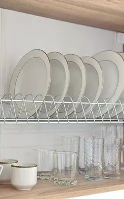 a shelf with glasses and plates on a wall at Glyfada Sea Breeze Loft A in Athens