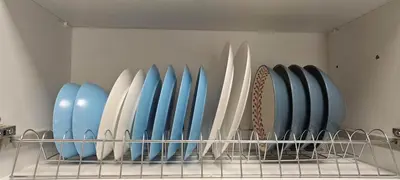 a group of surfboards lined up on a rack at \u6d77\u98ce\u5c0f\u61a9 Seabreeze Haven in Athens