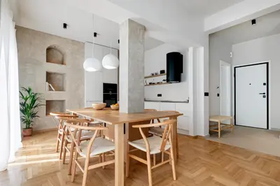 a kitchen and dining room with a wooden table and chairs at Syntagma Acropolis View Residence in Athens