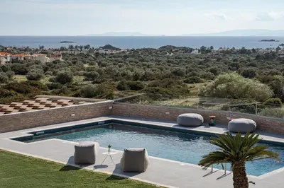 a swimming pool in a villa with a view at LaGon Luxury Villa in Foinikiá