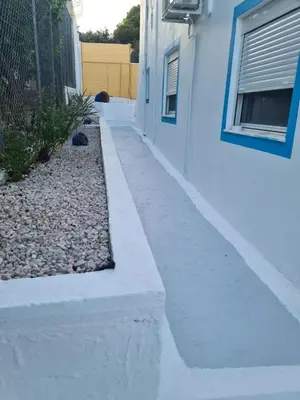 a puddle of water on the side of a building at Sea View Hill House in Porto Rafti