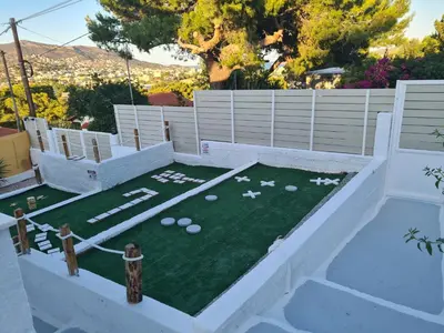 an image of a miniature golf course in a yard at Sea View Hill House in Porto Rafti
