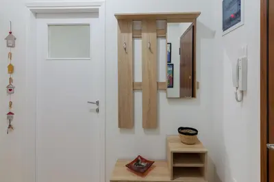 a room with a door and a mirror on the wall at Kipseli Dreams Stylish Apt, AC, WiFi in Athens