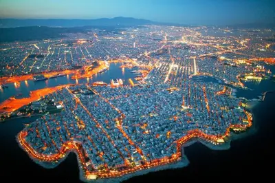 an aerial view of a city at night at Piraeus City Center Apartment Port & Metro Dimotiko theatro in Piraeus