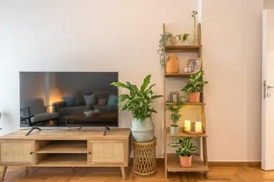 a living room with a coffee table and a couch at Zen Palm, Exarchia in Athens