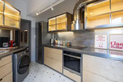 a kitchen with a sink and a stove at Amazing flat just 500 m from Acropolis museum in Athens