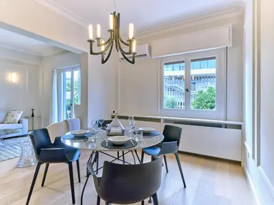 a dining room with a table and chairs at Adorac in Athens
