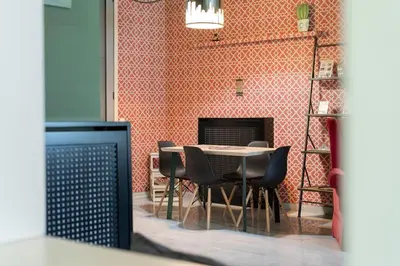 a dining room with a table and chairs at Athens' Pearl in Athens