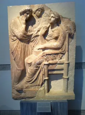 a relief in a museum with two women at Quiet apartment in the centre of Athens in Athens