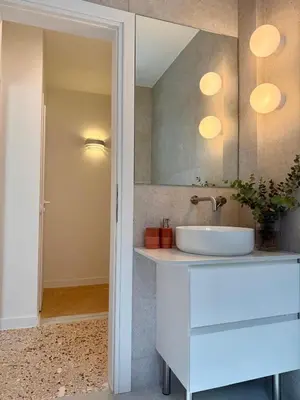 a bathroom with a sink and a mirror at Quaint & Central Acropolis apartment in Athens