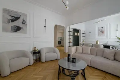 a living room with a couch and chairs and a table at Plaka Elegance Retreat in Athens