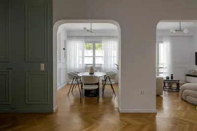 a living room with a table and a dining room at Plaka Elegance Retreat in Athens