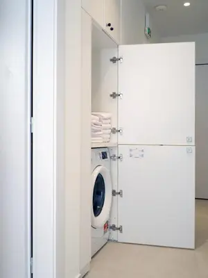 a laundry room with a washer and dryer at CorNeliApartment in Athens