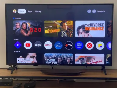 a flat screen tv sitting on top of a table at Cozy & Connected, Walk to Culture, Metro in Minutes in Athens