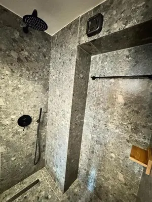 a shower with a glass door in a bathroom at Acropolis View 301 By Pantheon Ermou in Athens
