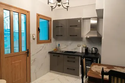 a kitchen with a sink and a counter at Athens King 1 in Athens