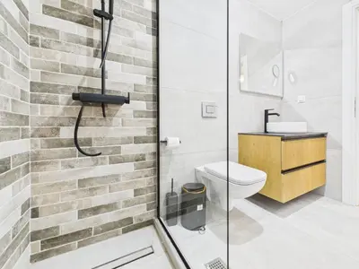 a bathroom with a shower and a toilet at KASO - Vresthenis - Acropolis View in Athens
