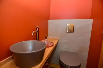 a bathroom with a sink and a toilet at Athens centre top floor stylish 2 min walk metro in Athens