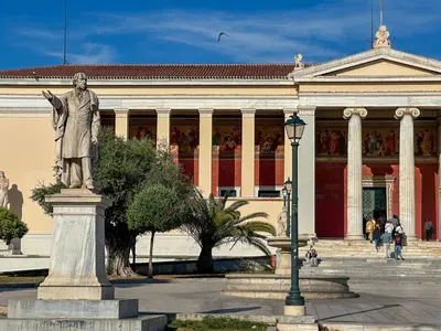 a statue of a man in front of a building at Athens centre top floor stylish 2 min walk metro in Athens