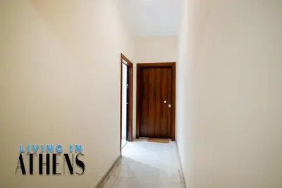 an empty room with a door and a hallway at Eugene's Luxury Apt 2&1 ppl 3min Walking Distance to Metro Station in Athens