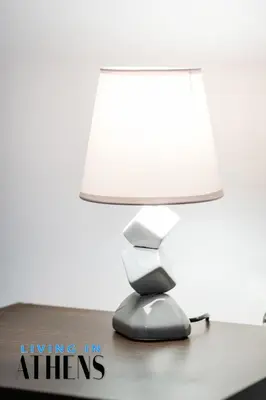 a lamp sitting on top of a table at Spacious Familly Apt Next To Acropolis And Museum 4&1 in Athens