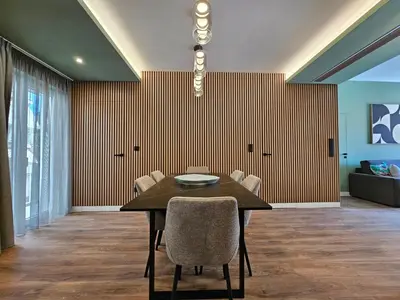 a dining room with a table and chairs at Acropolis Panorama Suite by YHA in Athens