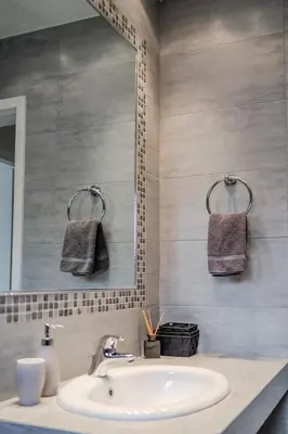 a bathroom with a sink and a mirror at 2bedroom Apartment in Glyfada in Athens