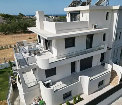 an aerial view of a white house at CasaMare Lagonisi Athens Riviera Luxury modern villas apartment's in Lagonissi