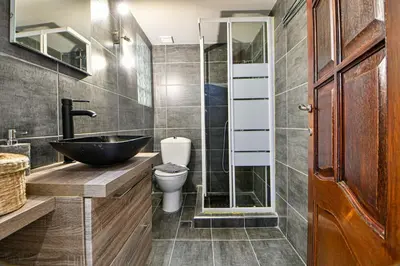 a bathroom with a sink and a toilet at Cozy Flat in Central Athens - Iris in Athens