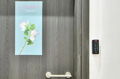 a picture of a flower hanging on a door at City Center Flat with Terrace (Capparis) in Athens