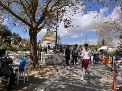 a young boy walking down a sidewalk at Thiseio Villa Acropolis View in Athens