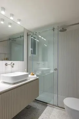 a bathroom with a tub and a sink and a shower at Athenian Vintage Apartment in Athens