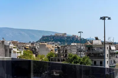 a view of a city from the roof of a building at Acropolis View - Stylish City Penthouse with Large Terrace in Athens