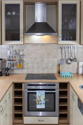 a kitchen with a stove top oven in a kitchen at CitySoul Athens in Athens