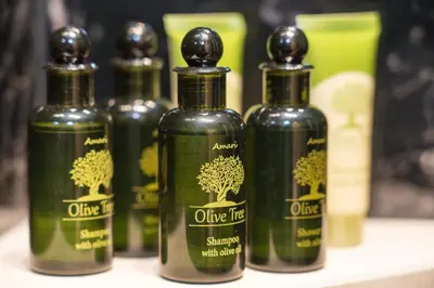 a group of olive trees bottles sitting on a counter at Athens apartment near city centre in Athens