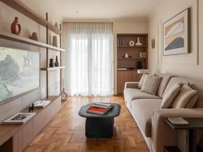 a living room with a couch and a table at Mixalakopoulou Luxury Apartment in Athens
