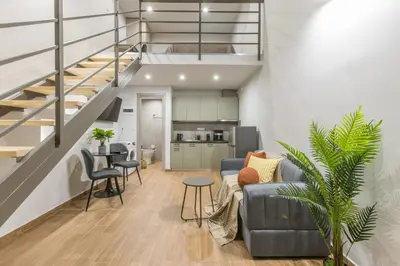 a living room with a couch and a table at Raise Egaleo Campus in Athens