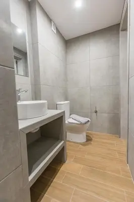 a bathroom with a sink and a toilet at Raise Egaleo Campus in Athens