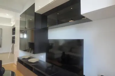 a kitchen with a black counter top in a room at Stylish city Apartment for 4 by MPS in Athens