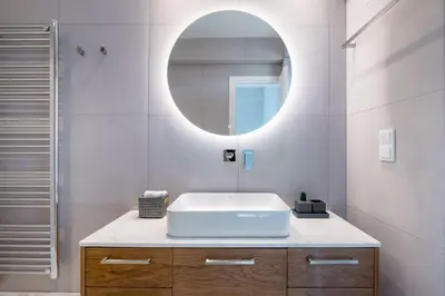 a bathroom with a white sink and a mirror at The HostMaster WiseView Acropolis in Athens
