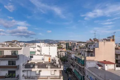 a view of a city with buildings at The HostMaster WiseView Acropolis in Athens