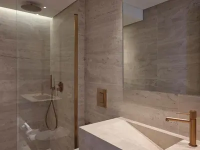 a bathroom with a shower and a tub and a sink at Nur City Suites in Athens
