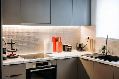a kitchen with a sink and a counter top at Alme Sélas in Port Rafti in Porto Rafti