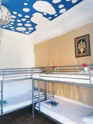 a room with bunk beds and a ceiling with a painting at SHARED ROOMS NEAR ACROPOLIS & MONASTIRAKi area in Athens