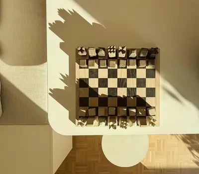 a chess board on a table in a room at Sunny Downtown Glyfada Penthouse in Athens