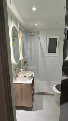 a bathroom with a sink and a toilet at Acropolis luxury home by Cleo in Athens