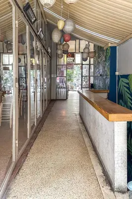 a bar in a restaurant with graffiti on the walls at Industrial-Style Apt in Psyrri, Walk to Acropolis in Athens