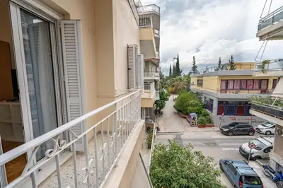 an apartment balcony with a view of a street at Spacious 3-Bedroom Apartment in Neos Kosmos by ΜΡS in Athens