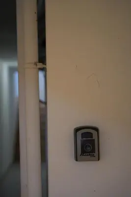 a socket on a wall with a camera on it at Summer Vacation Home in Vouliagmeni for 4 by Filos Inc in Athens