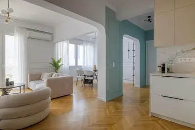 a living room with a couch and a table at Timeless Plaka Retreat in Athens
